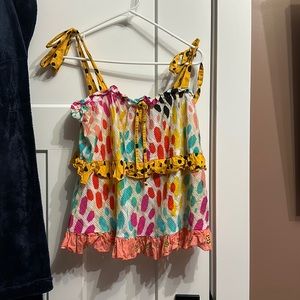 Multi- colored tiered tank